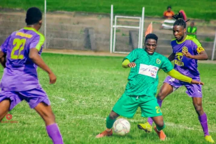 Luke Chima (in green) in action for Civo Service United