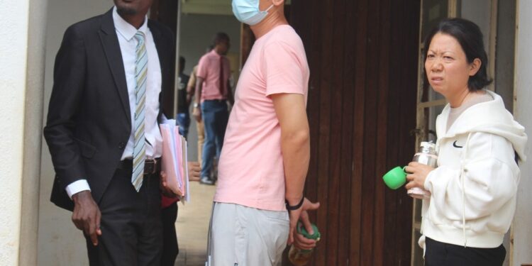 Two Chinese nationals jailed over financial crimes